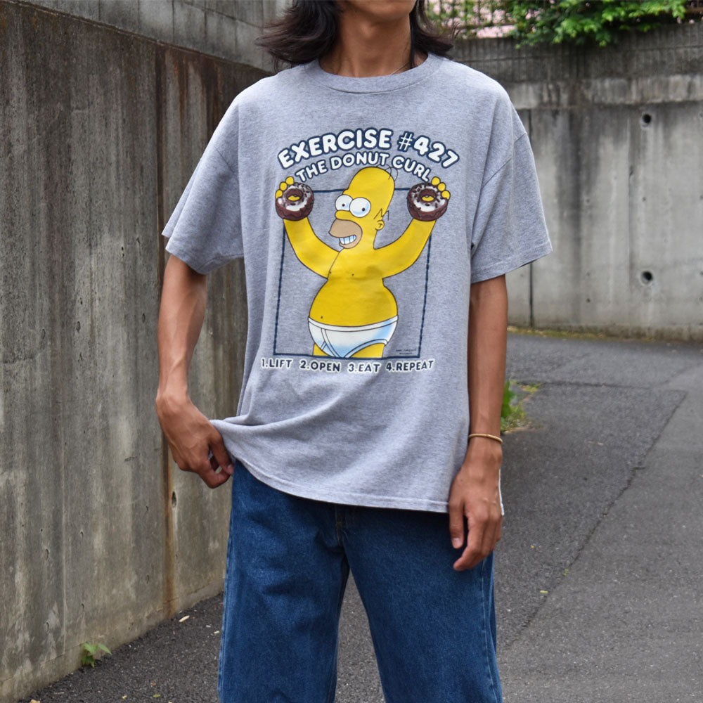 's The Simpsons/ザ・シンプソンズ “EXERCISE ＃” Tシャツ
