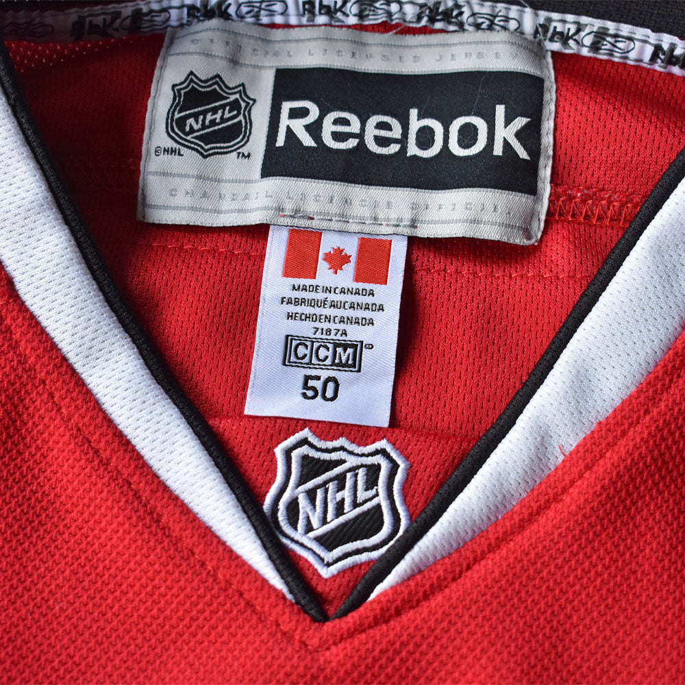 REEBOK “NHL Chicago Blackhawks ＃19 TOEWS” ホッケーシャツ カナダ製 240402