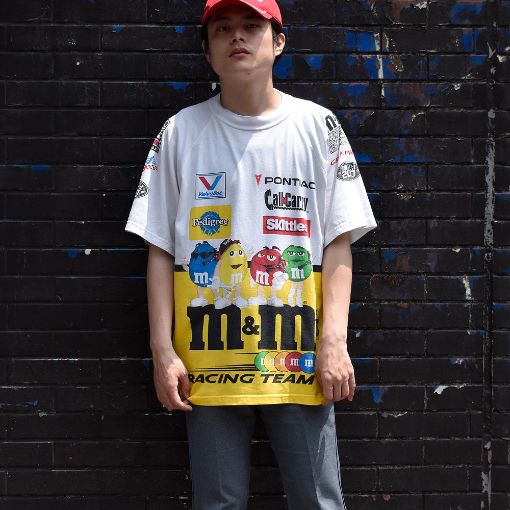 Y2K COMPETITORS VIEW “M&M’s“ ラグランスリーブ レーシングTシャツ 250710H