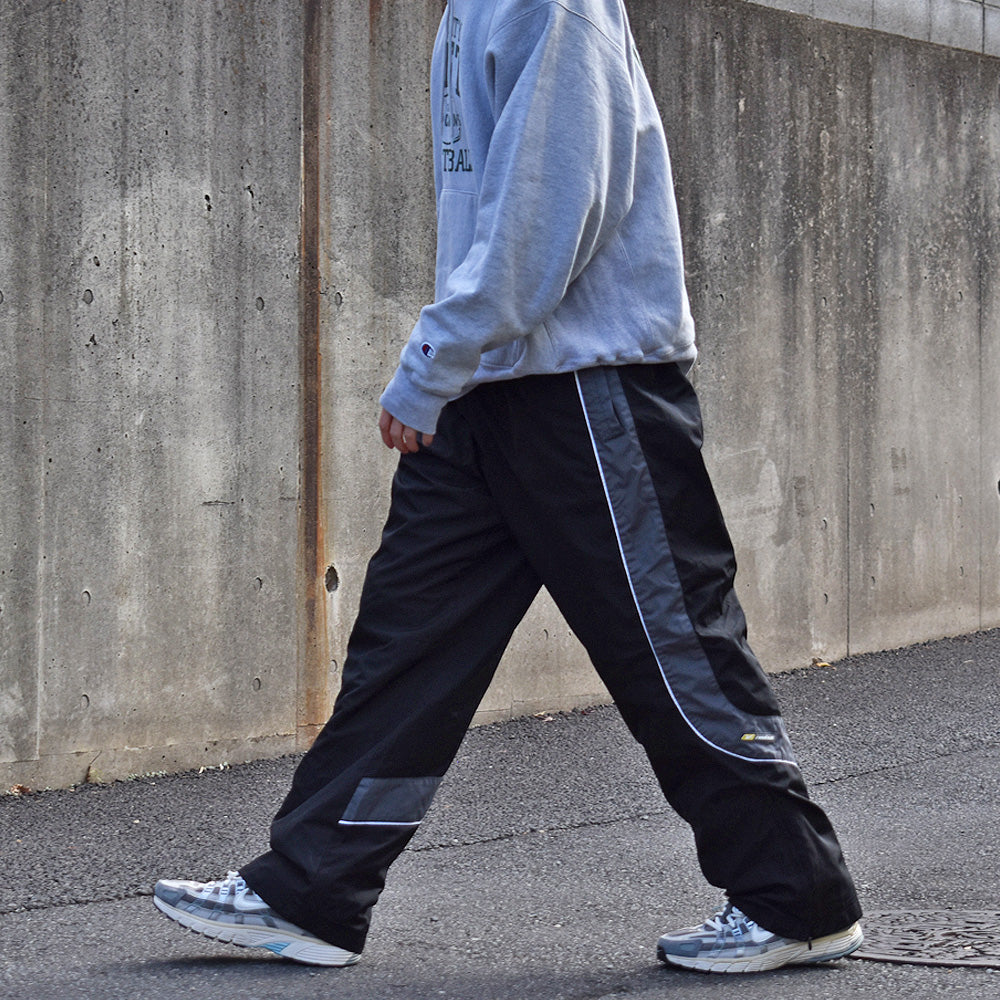 Reebok ナイロントラックパンツ 231201